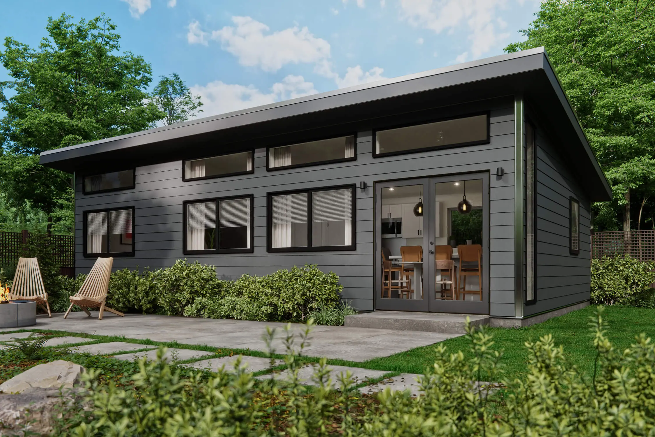 summit-680_clear_2 Modern gray house with large windows and greenery.
